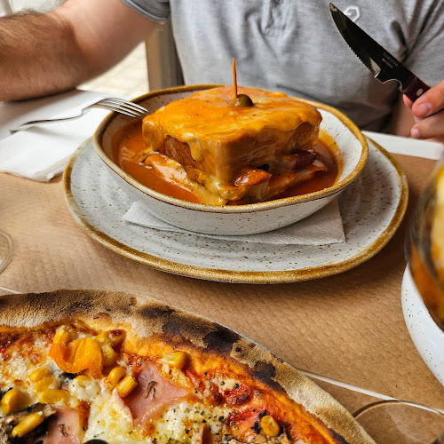 Opinii despre Restaurante-Pizzaria Beira Rio în Viana do Castelo - Gastronomia e hotelaria