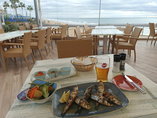 Opinii despre Julia’s restaurant,beach bar & lounge în Almancil - Gastronomia e hotelaria