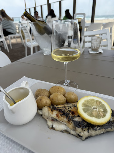 Reviews of O Golfinho Restaurante Bar in Costa da Caparica - Gastronomia e hotelaria
