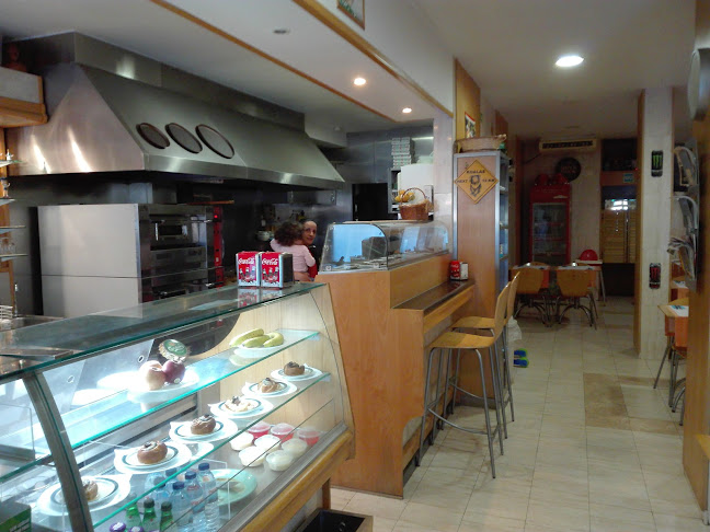 Pizza Ouressa - Gastronomia e hotelaria