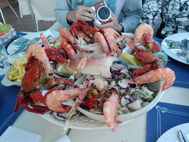 Opinii despre Portinho de Areia în Peniche - Gastronomia e hotelaria