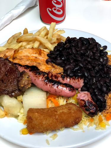 Black Angus Tavira Phone number