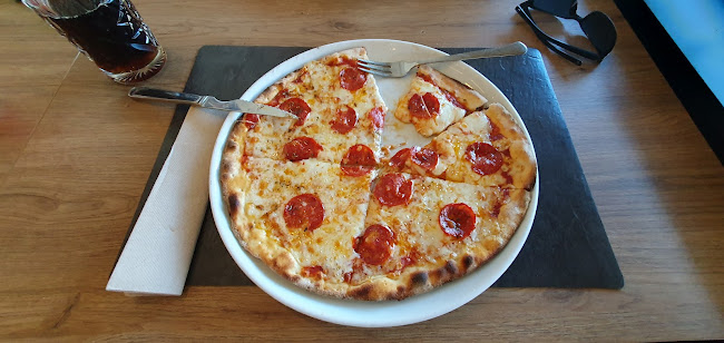 Troia Pizzaria & Restaurante - Gastronomia e hotelaria