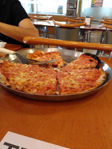 Troia Pizzaria & Restaurante - Gastronomia e hotelaria