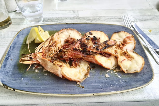 Opinii despre Julia’s restaurant,beach bar & lounge în Almancil - Gastronomia e hotelaria